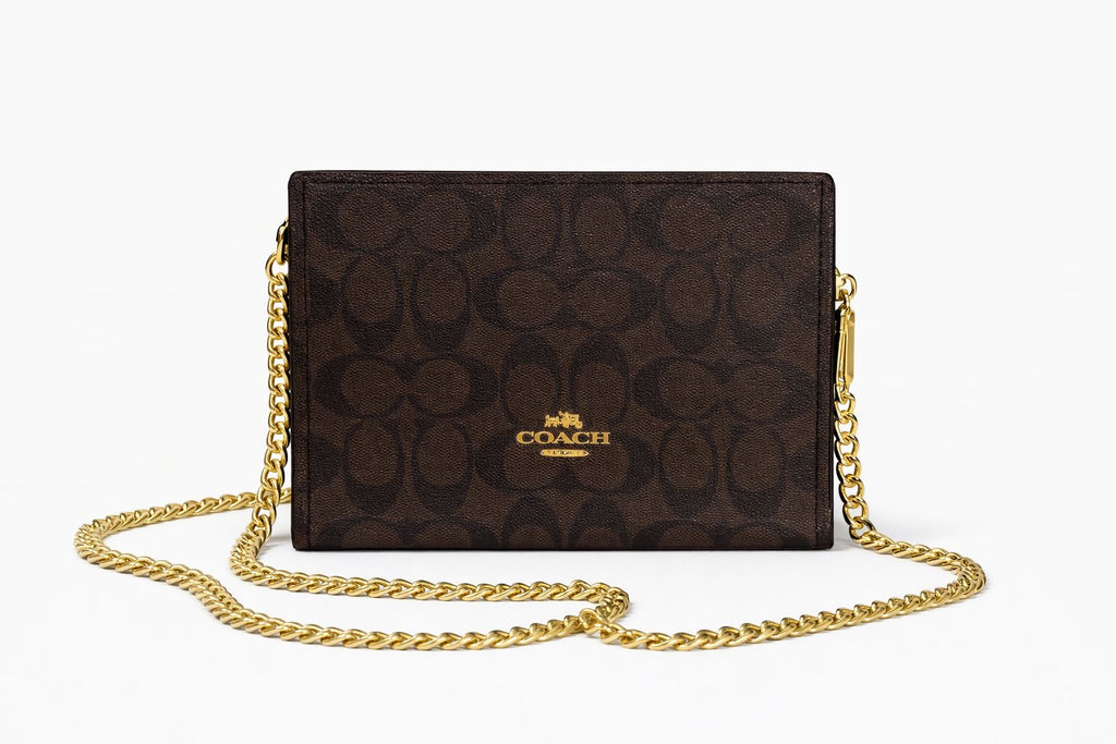 Bolso Coach Crossbody Clutch en Lona Signature - Color Brown/Black con Cadena Dorada